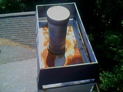 Norcross's Best Gutter Cleaners' Certainteed Certified roofers can install or replace your custom chimney pan.